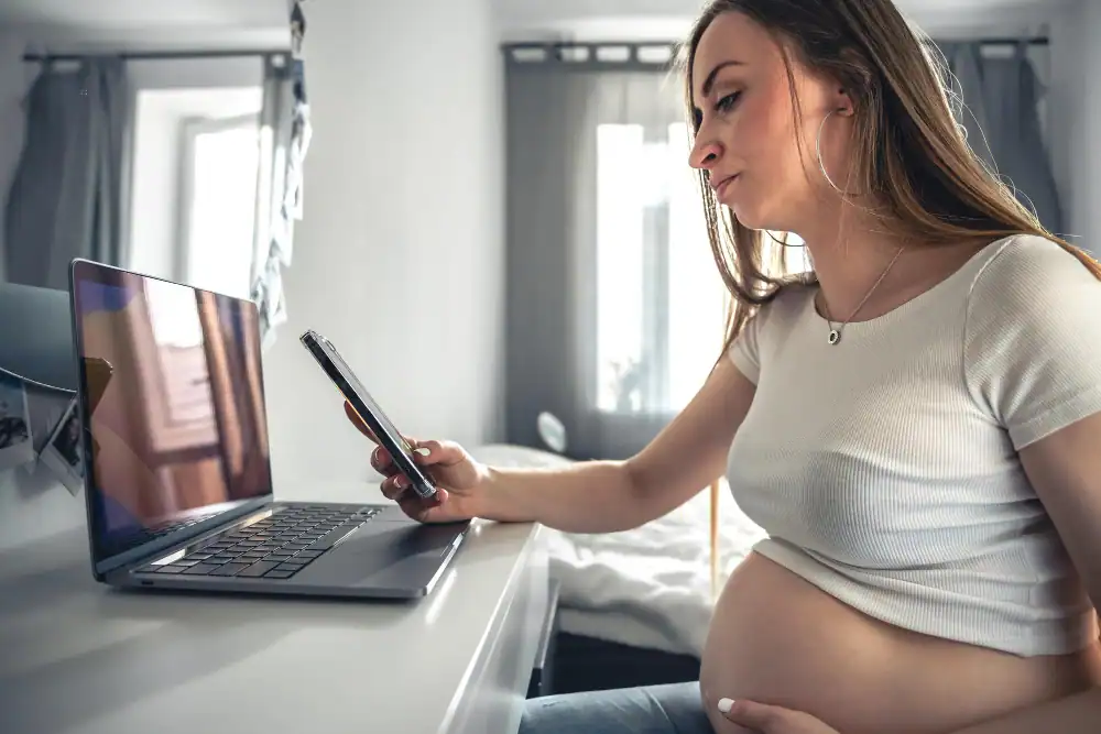 Digital pregnancy test showing a positive result